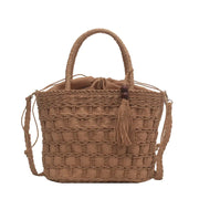 ladies tassel Handbag-held Diagonal Dual-use Bag in brown straw with a stylish tassel detail.