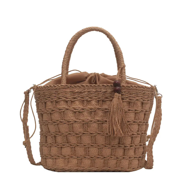 ladies tassel Handbag-held Diagonal Dual-use Bag in brown straw with a stylish tassel detail.
