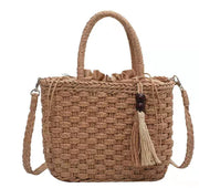 Ladies tassel Handbag-held Diagonal Dual-use Bag in brown straw with a stylish tassel detail.