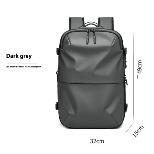 Pro Commuter Backpack in dark grey, waterproof design fits 17-inch laptop, perfect for travel and daily use.