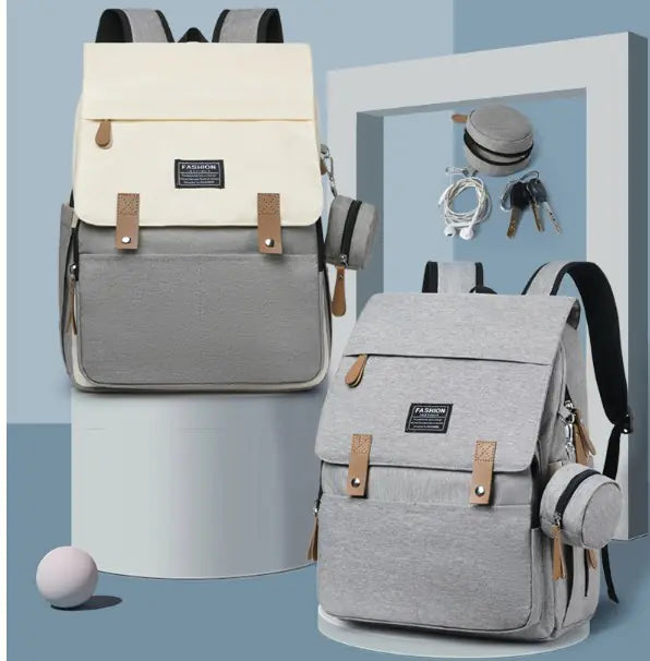 Mommy Backpack Multifunction Baby Diaper Bag displayed in gray and cream colors, ideal for stylish moms on the go.