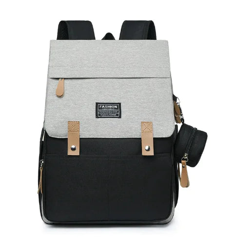 Stylish mommy backpack in gray and black, designed for multifunctional use as a diaper bag.