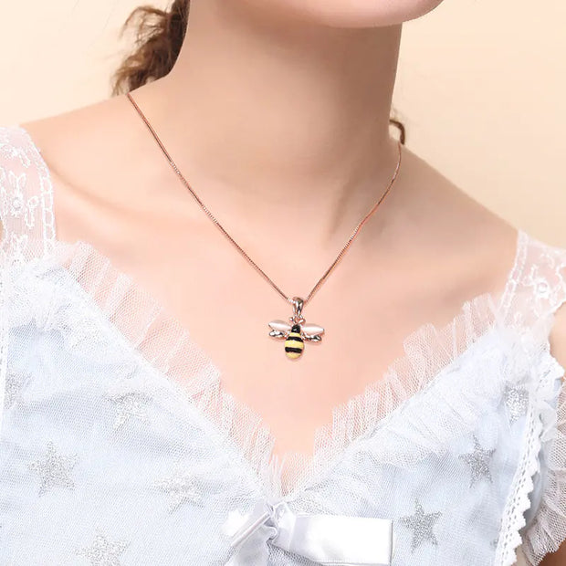 Bee Necklace featuring a gold bee pendant on a delicate collarbone chain