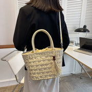 ladies tassel handbag in black with gold zipper