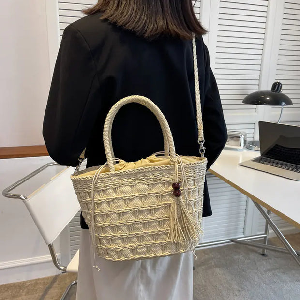 ladies tassel handbag in black with gold zipper