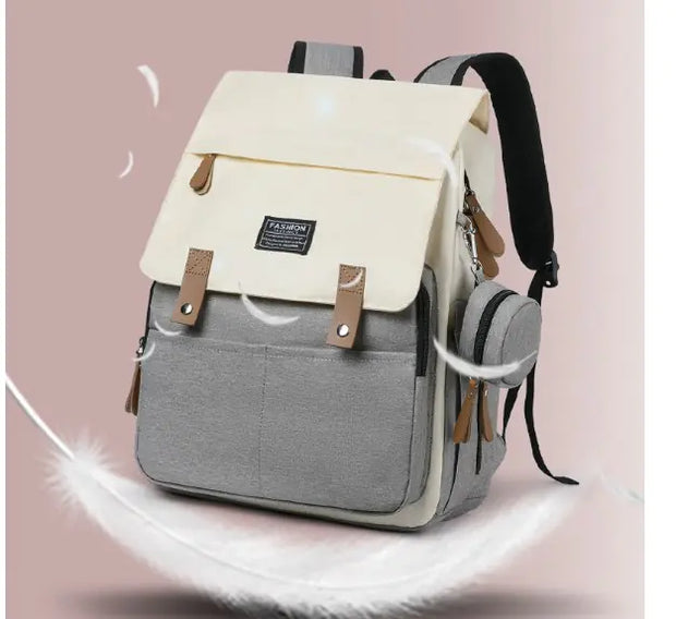 Mommy backpack multifunction baby diaper bag in stylish beige and gray design, perfect for organized outings.