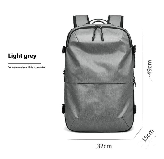 Pro commuter backpack in light grey, designed to accommodate a 17-inch computer, waterproof and stylish.
