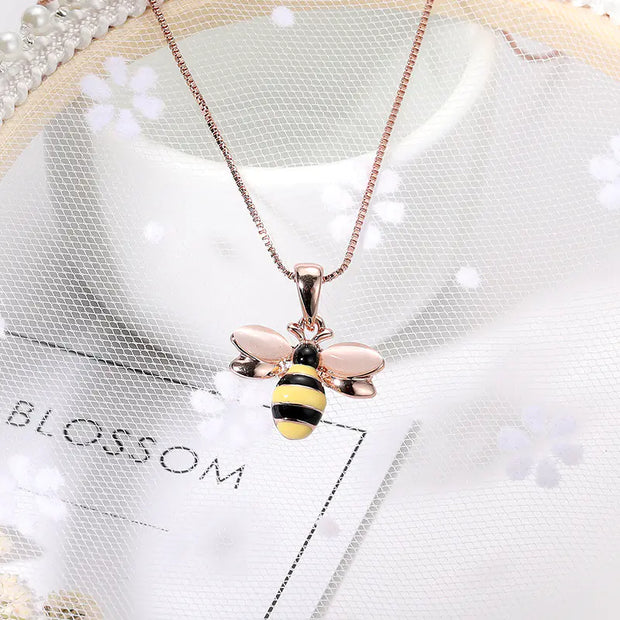 Bee Necklace featuring a gold bee pendant on a delicate collarbone chain